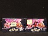 deux boîtes de dentifrice Lorcana posées sur une surface noire