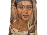 an image of a close up of a piece of wood with a painting on it