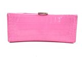 a pink wallet with a metal clasp on the front