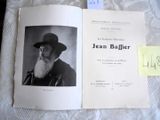 un livre sur lequel figure la photo d'un homme portant un chapeau
