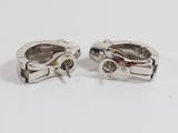 a pair of silver plated cuff rings