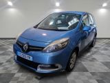 a picture of a blue car parked in a garage