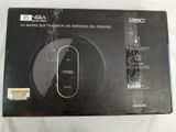 an open box of a wireless device sitting on top of a table