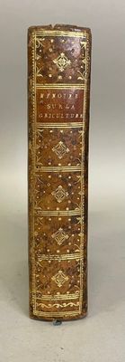 an old book that is sitting on top of a table