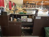 an image of a kitchen with a lot of items on the counter