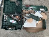 a box of tools that are sitting on the ground