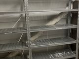 two shelves that have some items in them