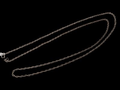 a close up of a chain on a black background