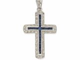 un pendentif en forme de croix, orné de diamants et de saphirs, sur fond blanc