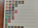 a lot of stamps on the pages of a book