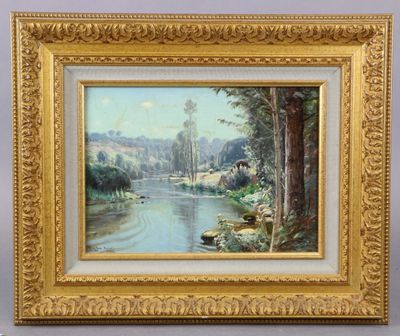 une image représentant un tableau représentant une rivière, dans un cadre doré