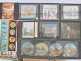 many pictures of people on display in a display case