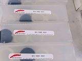 several different types of thermometers are lined up on a table