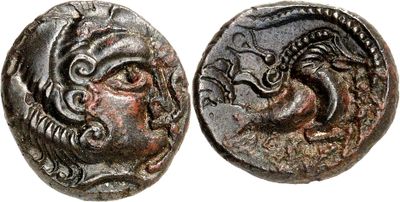a silver coin with an image of a woman and a dragon on it