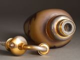 an image of a glass vase with a metal handle