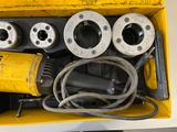 a yellow box with a bunch of tools inside of it
