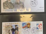 two stamps with a picture of a man and a woman on them