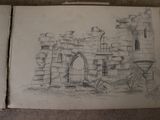 two drawings of a castle with a gate in the middle