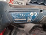 a close up of a corded drill with a number on it