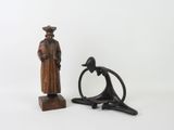 two figurines of a man and a woman on a white background