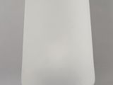 blue and white table lamp with a white shade on top of it