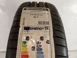 a close up of a tire with a sticker on the side of it
