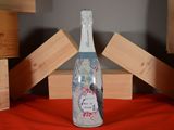 a bottle of wine that is sitting on a table