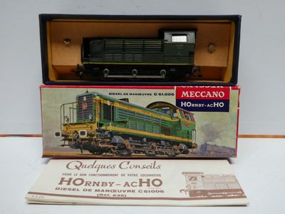 a box with a train on top of it on a table