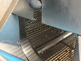 an image of a machine that is making dough