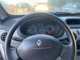dashboard of a car with a steering wheel and dashboard gauges