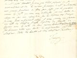 un vieux document sur lequel figurent une lettre manuscrite et l'image d'un oiseau