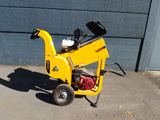 a small machine that is sitting on the side of the road