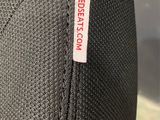 a close up of a seat with a label on it