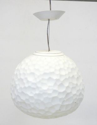 a white light that is hanging from the ceiling