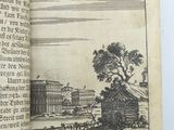 an open book with a drawing of a village in the middle of it
