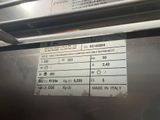 a picture of a stainless steel oven with a price label on it