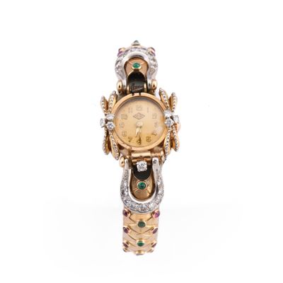 Bracelet-montre de dame en diamants, rubis et émeraudes des … - Photo 1