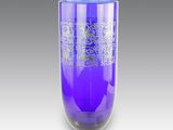 vase en verre violet orné d'un motif sur l'extérieur