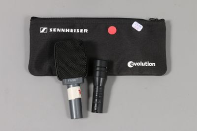 a close up of a pair of microphones on a table