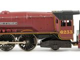 a toy train that is sitting on a white surface