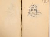 an open book with a drawing of a person on it