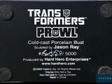 a sign that says transformers now on the side of a building