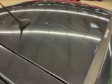 a close up of a car ' s hood with a antenna on top of it
