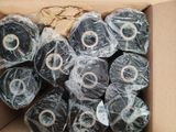 many rolls of toilet paper wrapped in plastic wrap in a box