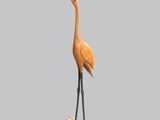 un oiseau perché sur un morceau de bois