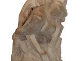 statue of a man and woman sitting on a rock on a white background