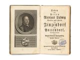 an old book with a picture of a man in a suit and tie