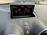 a car dashboard with a digital display in the center