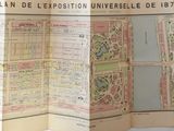 a map of the city of paris on display in a room