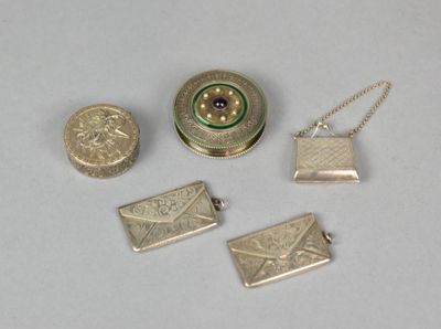 three different types of silver and gold jewelry on a white surface